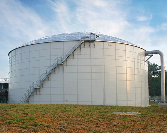 white bolted liquid storage tank with an aluminum dome cover